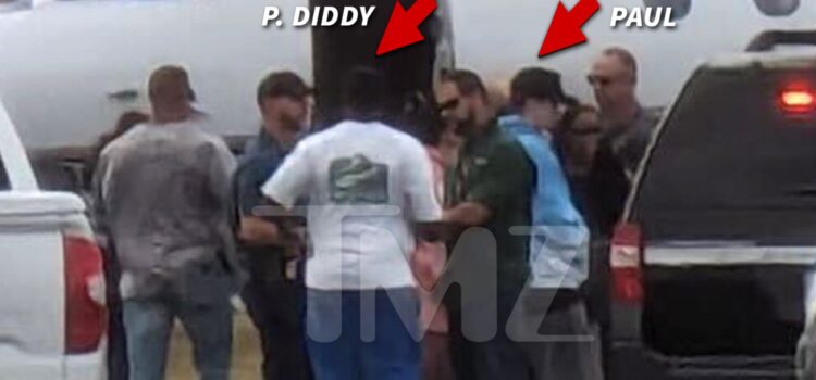 diddy-seen-talking-with-federal-agents-at-airport-as-associate-is-arrested
